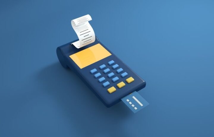 A blue card reader with a receipt printout and inserted card on a blue background.